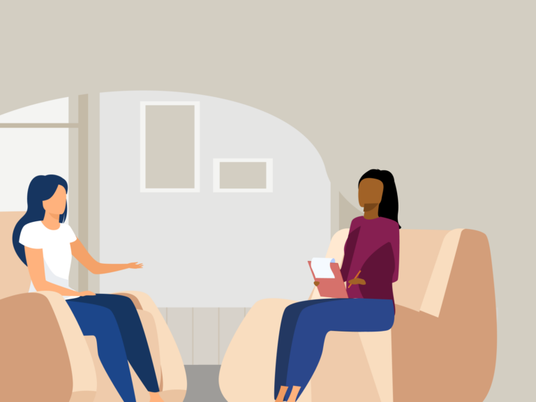 two people sitting together for therapy and counselling, speaking to a psychologist