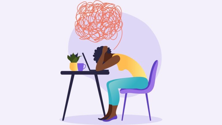 Illustration einer Person, die an einem Schreibtisch sitzt, den Kopf in den Händen, gestresst wirkend, mit einer gekritzelten Gedankenblase über sich. Eine Tasse und eine Topfpflanze stehen auf dem Schreibtisch. Der Hintergrund ist hellviolett.