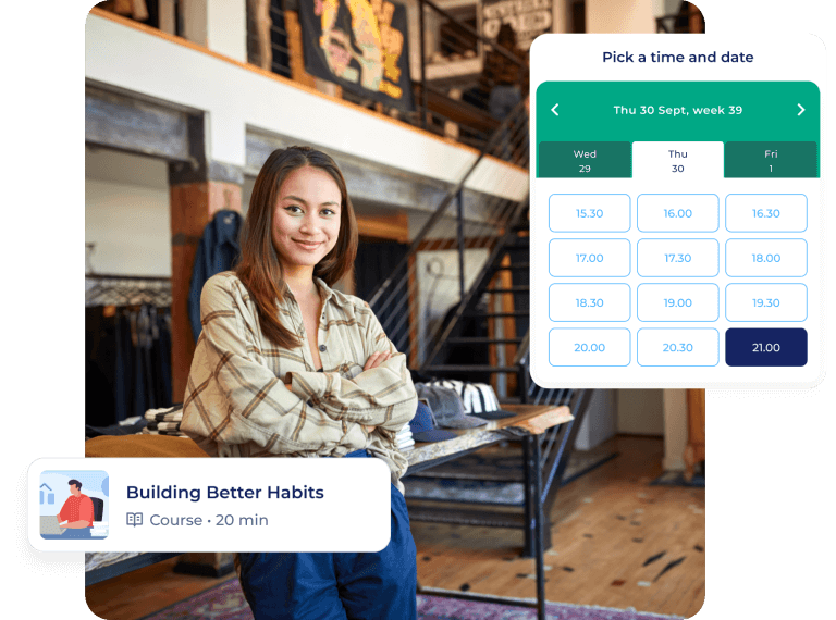 A smiling retail worker stands in a loft-style room with exposed beams. Next to her, an appointment booking interface for the Building Better Habits course displays available times on September 30th, with 21:00 selected.
