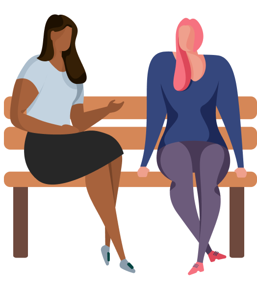 Two women sit on a wooden bench, one with dark skin and brown hair wearing a skirt and light top, and the other with light skin and pink hair wearing a blue top and leggings.